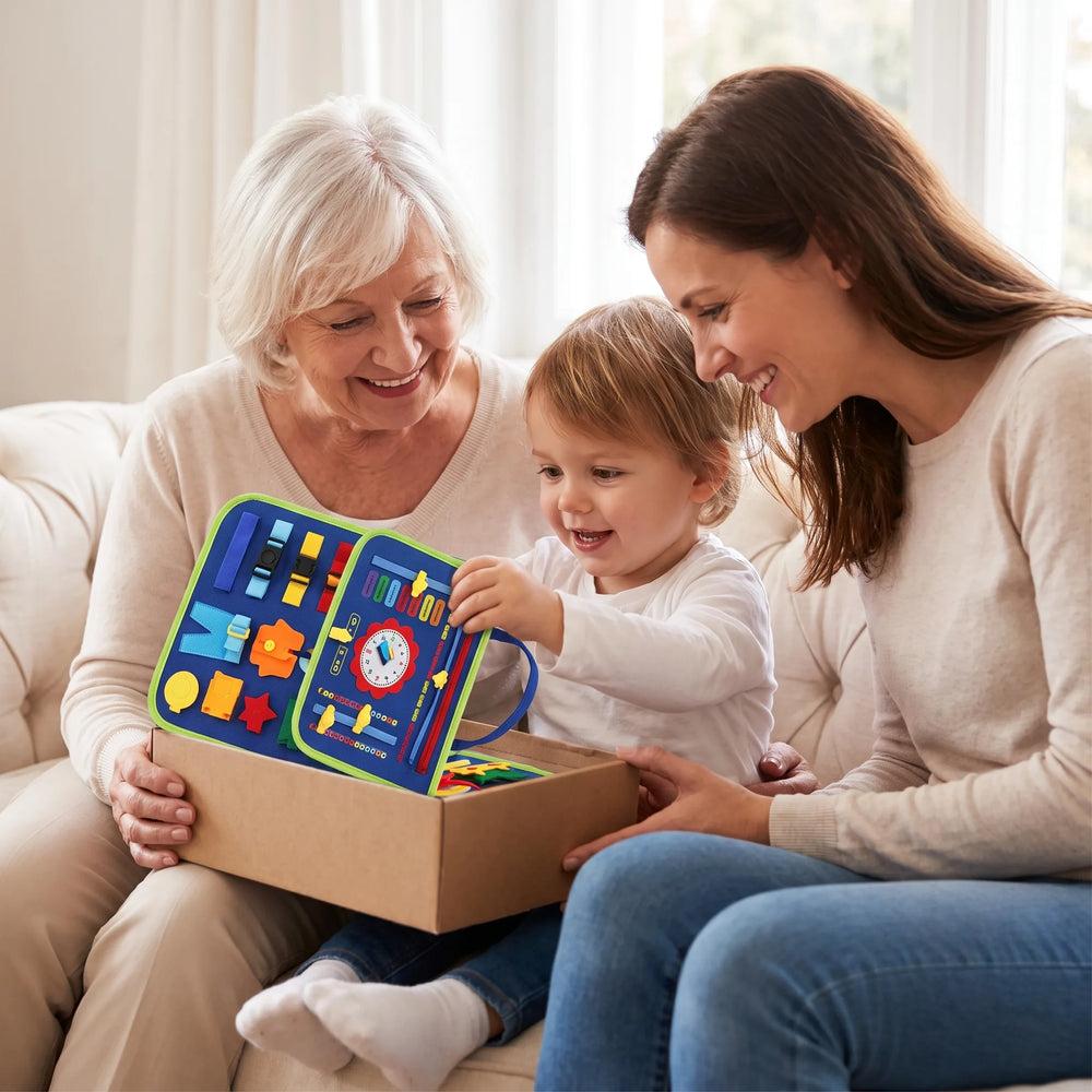 A nan, a mum and a toddler opening the Lysby busy board gift