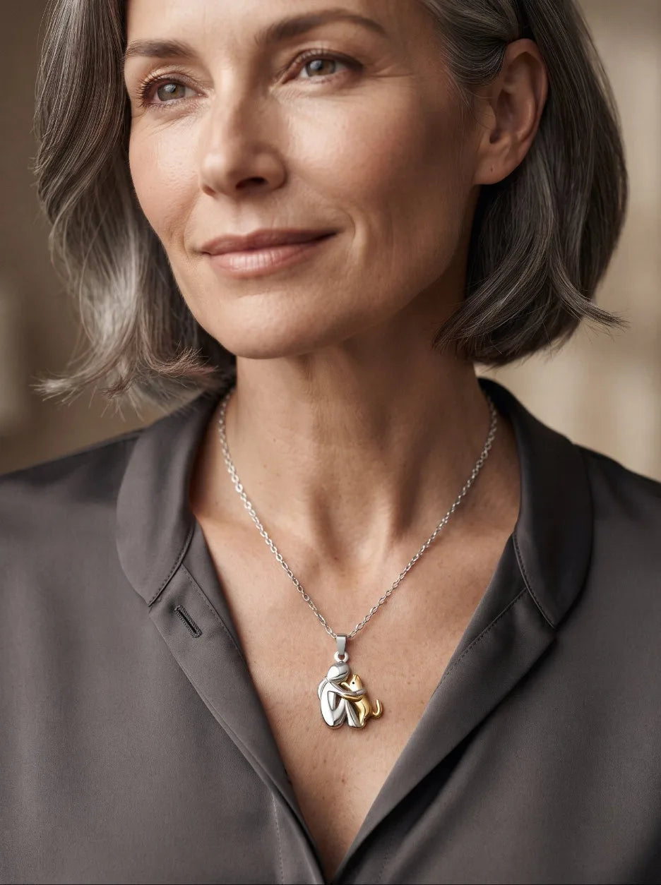 Woman wearing the cat Eternal Hug Necklace