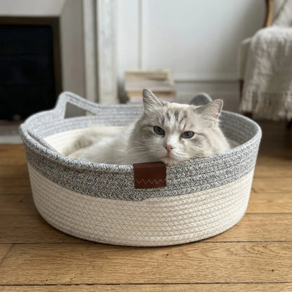 Fluffy cat resting in the Grey Woven Cat Nest